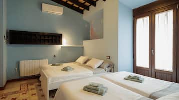 Een strijkplank/strijkijzer, wifi, beddengoed