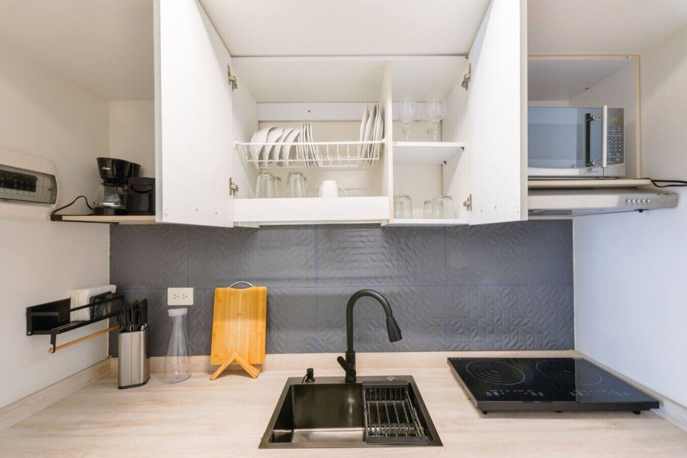 Microwave, stovetop, coffee/tea maker, toaster