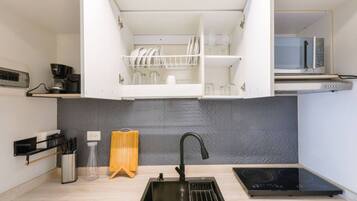 Microwave, stovetop, coffee/tea maker, toaster