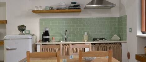 Fridge, microwave, stovetop, cookware/dishes/utensils