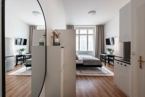 Desk, iron/ironing board, free WiFi, bed sheets - Stylish Riverside Studio | City Center, Park & Smart TV by EasyBNB Premium (Prague)