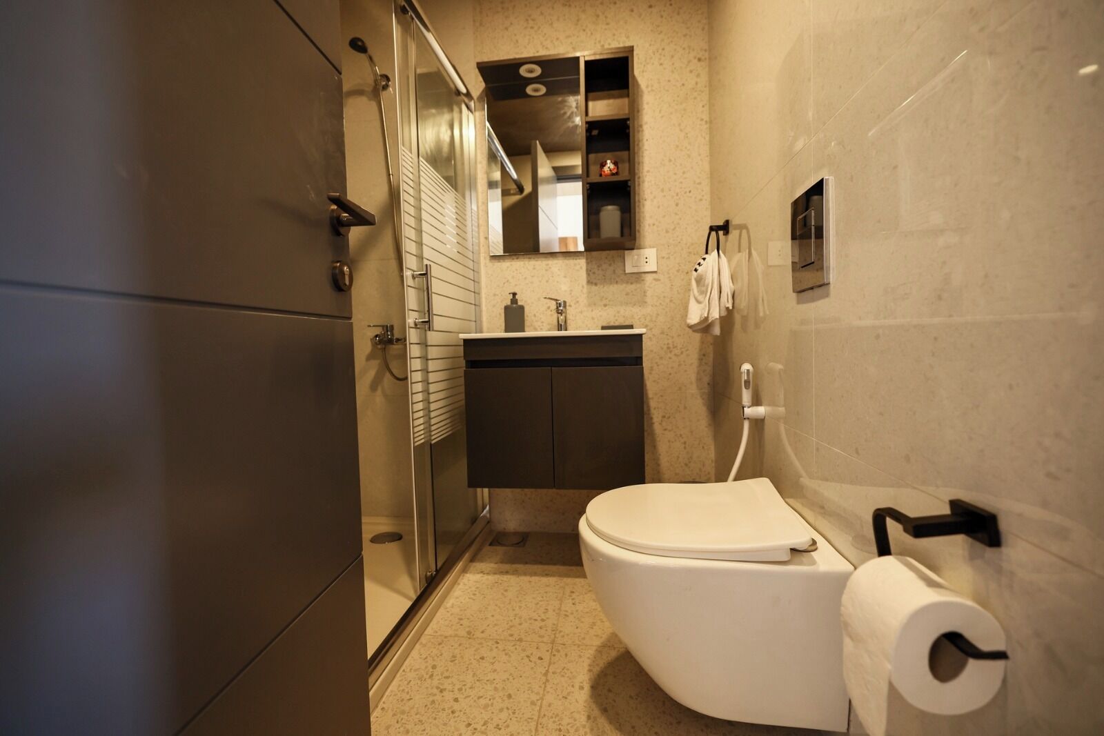 Hair dryer, towels, soap, toilet paper