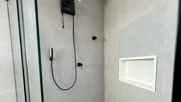 Shower, towels, toilet paper