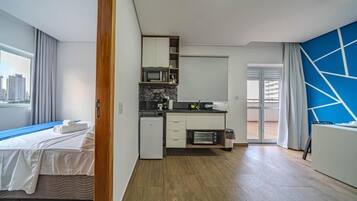 Economy Twin Room, City View | Living area