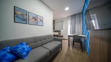 Economy Twin Room, City View | Living area