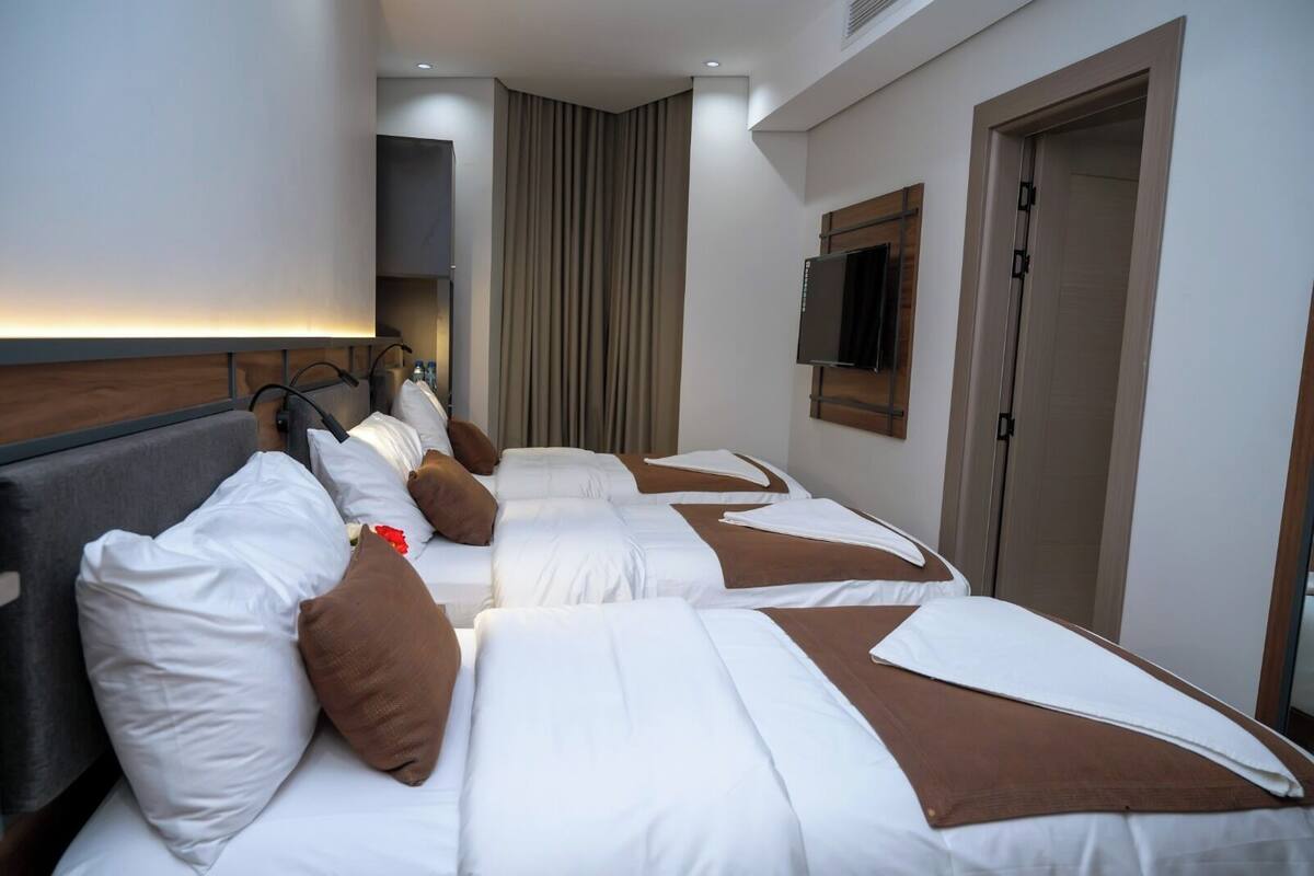 Chambre triple Deluxe | Accès au Wi-Fi (inclus), literie fournie