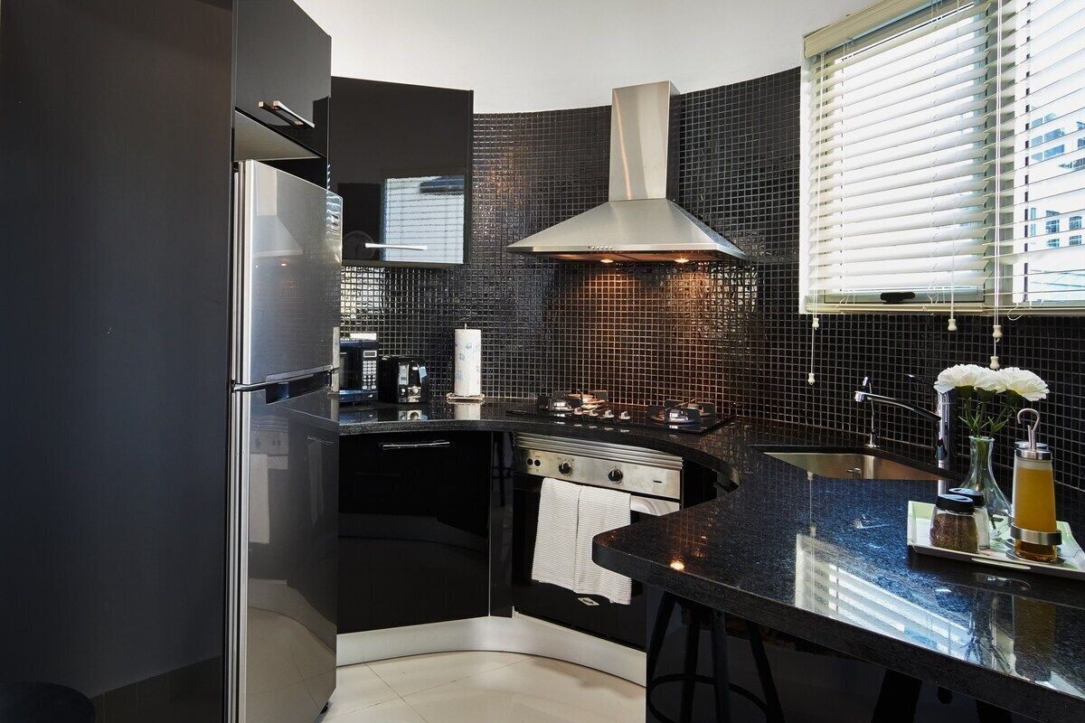 Luxury Apartment | Private kitchen | Full-size fridge, microwave, oven, stovetop