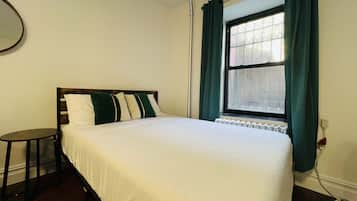 Een strijkplank/strijkijzer, reisbedje, gratis wifi