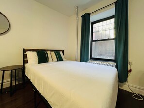 2 slaapkamers, een strijkplank/strijkijzer, gratis wifi, beddengoed