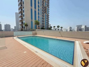 Outdoor pool - Vogue | Jeewar By Badr JVC near Circle Mall (Dubai)