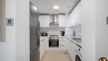 Luxury Apartment, Balcony, Park View | Private kitchen | Full-size fridge, microwave, oven, stovetop