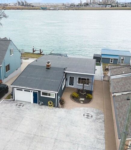 Serene Waterfront Getaway | Patio and Dock