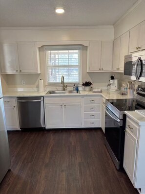 Microwave, oven, stovetop, dishwasher - Spacious 4BR Home with Game Room (Greensboro)