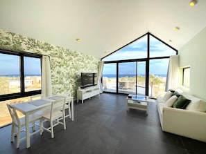 Living area - Sea & Golf View 2BR Villa with Beach & Pool Access & Terrace - Seascape Stays (Soma Bay)