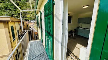 Penthouse Panoramique, plusieurs lits, balcon, vue océan | Terrasse/Patio