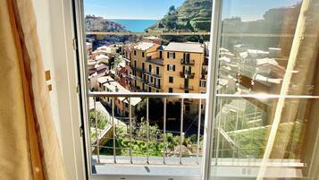 Chambre Panoramique, plusieurs lits, climatisation, vue mer