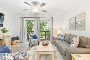 TV, offices - Cozy Coastal Retreat - Walk to Beach & Pool (Hilton Head Island)