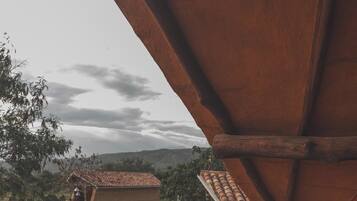 Family Cabin, Mountain View | Minibar, bed sheets