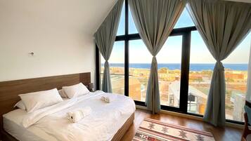 2 slaapkamers, een strijkplank/strijkijzer, wifi, beddengoed