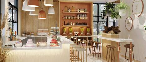 A modern kitchen with a central island, bar stools, hanging plants, and a variety of kitchenware on shelves.