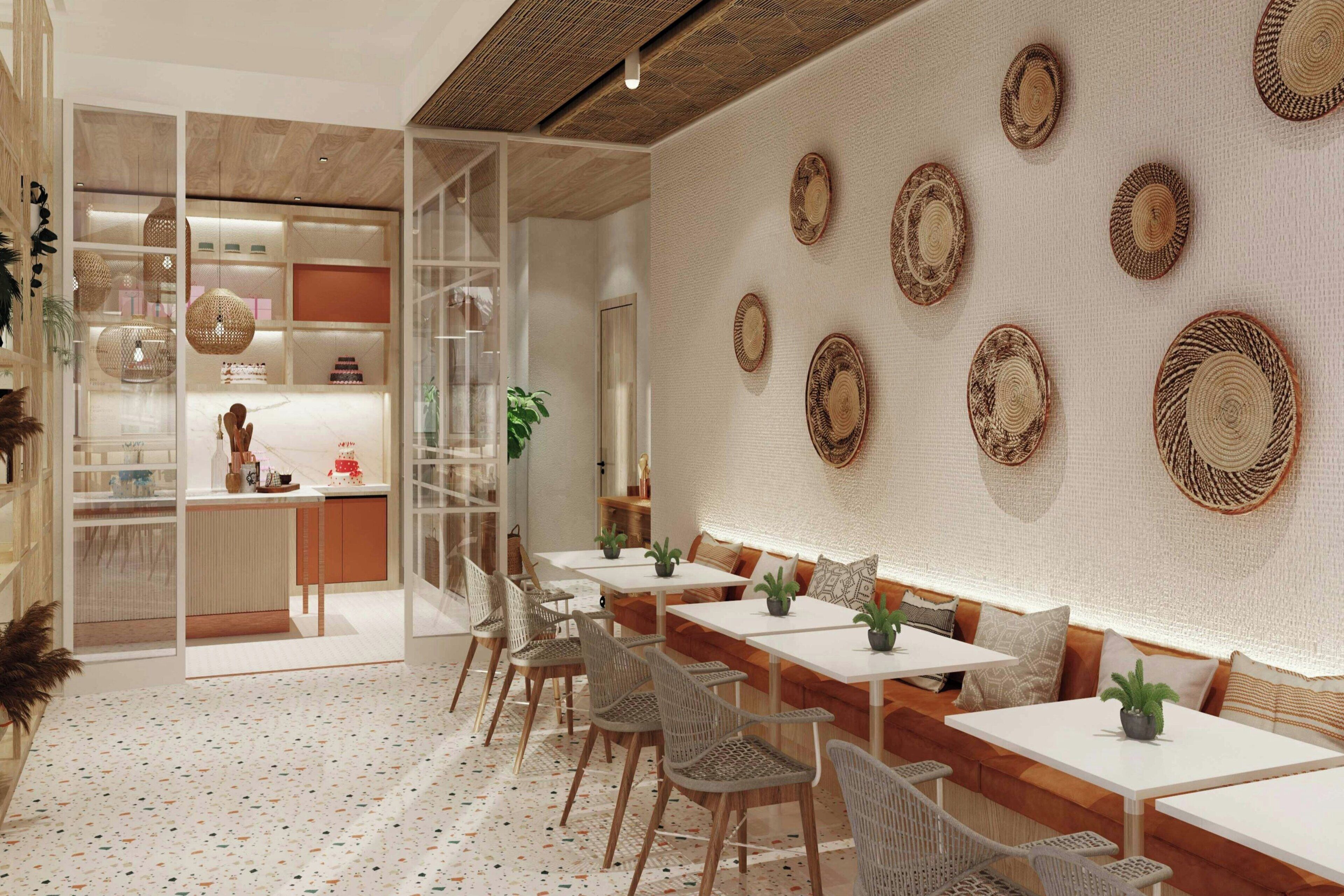 Uma sala de jantar moderna com mesas e cadeiras, área de cozinha com armários e arte de parede trançada decorativa.