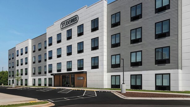 A multi-story building with a sign reading 'STUDIOS'. - StudioRes by Marriott Greensboro Airport (Greensboro)