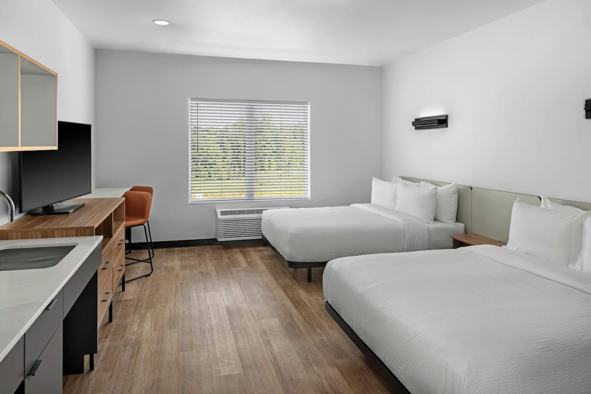 Studio, 2 Queen Beds | Desk, laptop workspace, WiFi (free), bed sheets