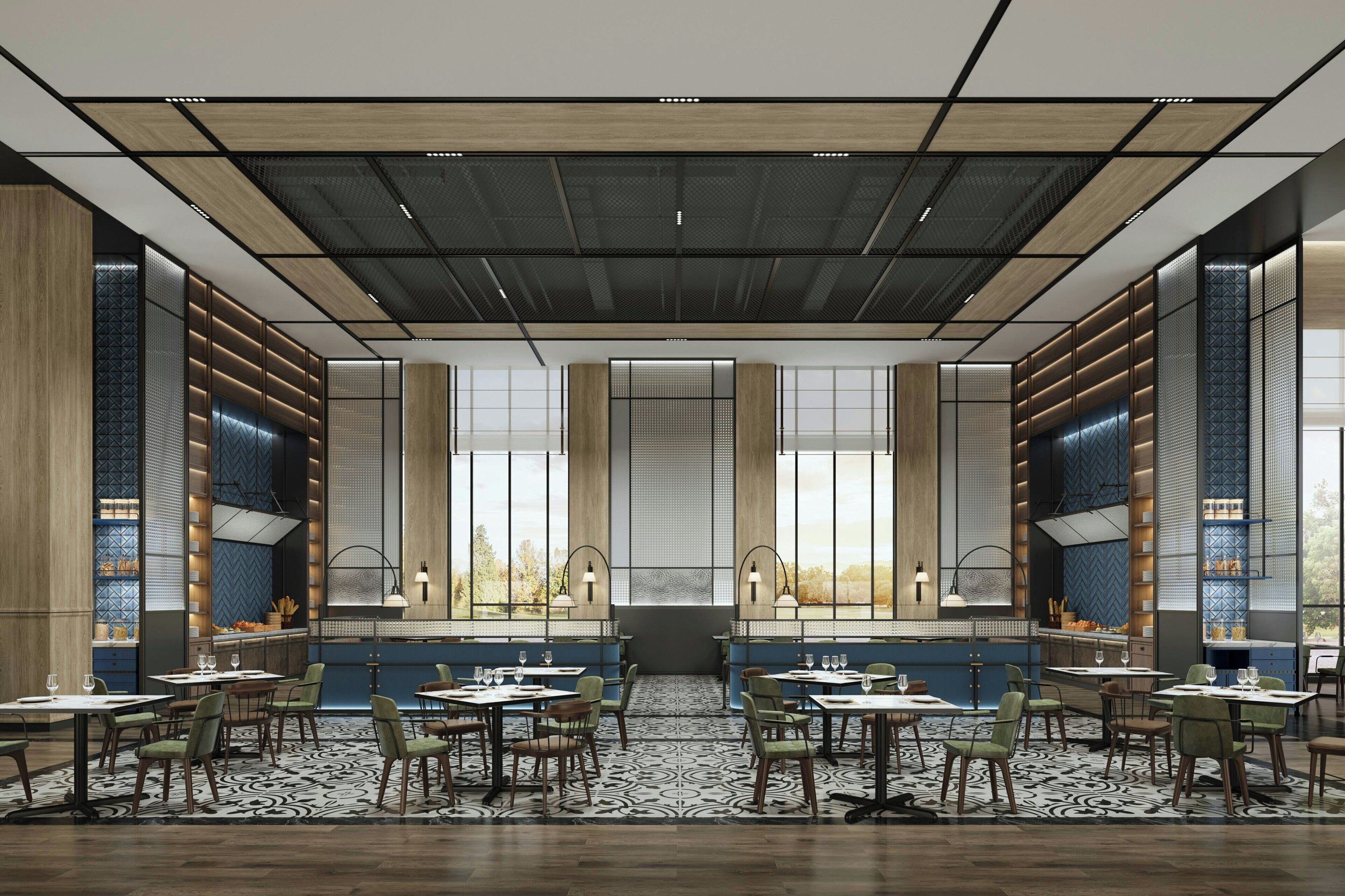 A modern dining area with multiple tables and chairs, large windows, and a patterned floor.