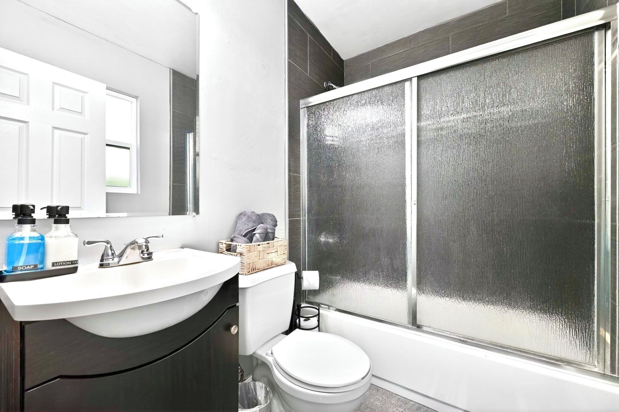 Hair dryer, towels, soap, shampoo