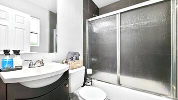 Hair dryer, towels, soap, shampoo
