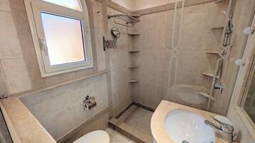 Shower, jetted bath, hair dryer, bidet