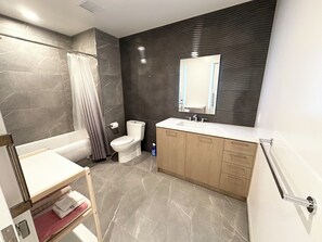 Hair dryer, towels, soap, toilet paper - Luxury high-rise condo in Downtown LA with city views. (Los Angeles)