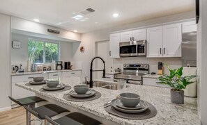 Fridge, microwave, oven, stovetop - This house is a 3 bedroom(s), 2.5 bathrooms, located in San Antonio, TX. (San Antonio)