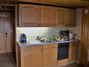 Fridge, oven, cookware/dishes/utensils
