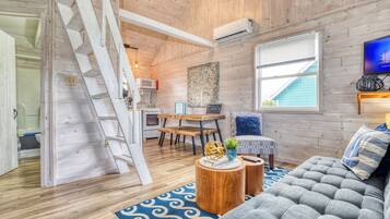 Smart TV, DVD player, foosball, books