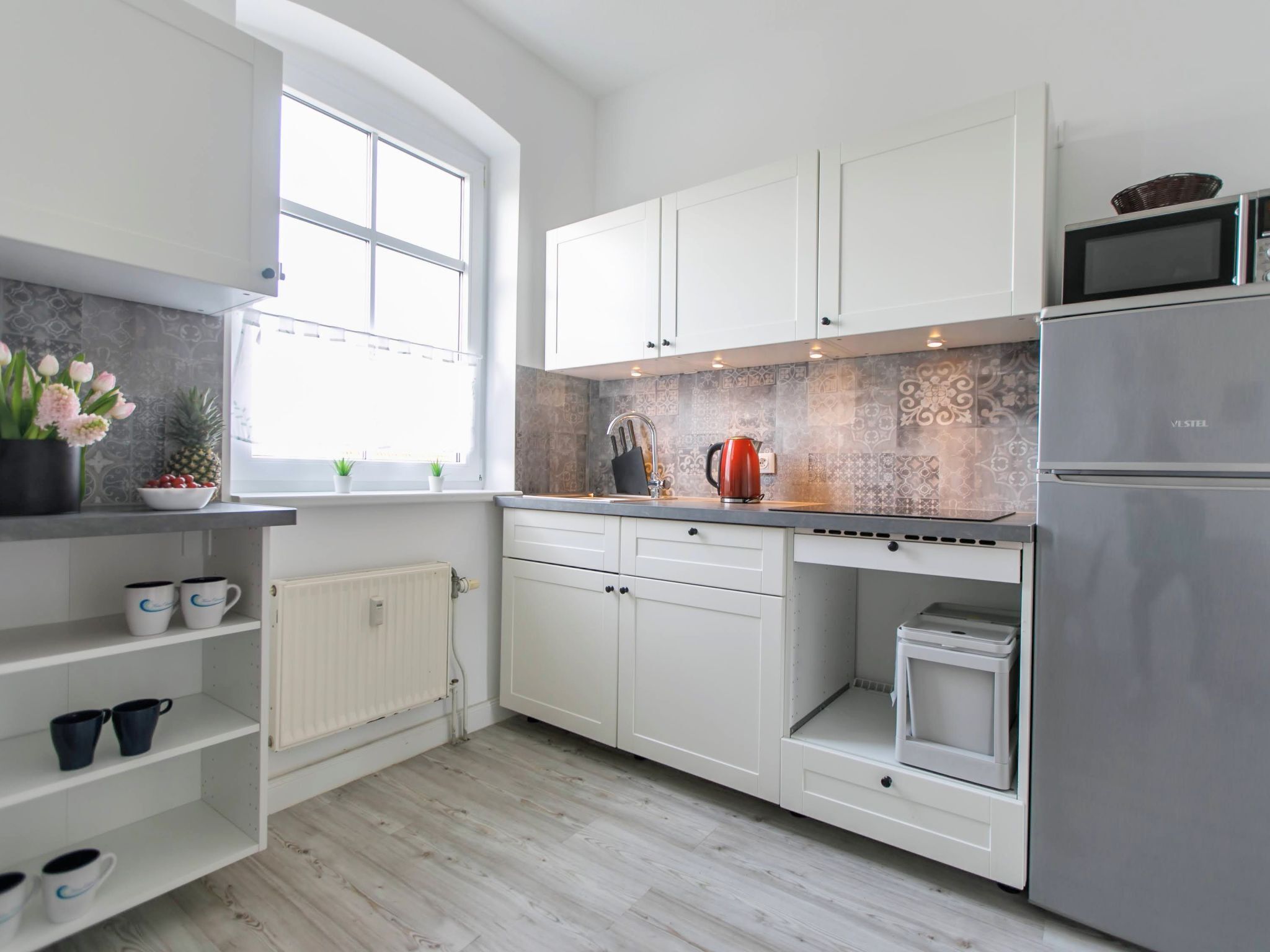 Fridge, microwave, cookware/dishes/utensils