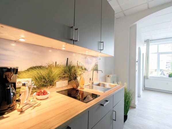 Fridge, microwave, cookware/dishes/utensils