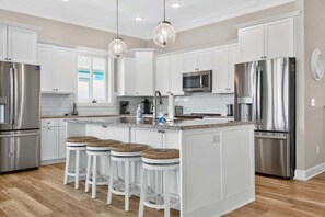 Fridge, microwave, oven, stovetop - Isle Have Another by Brunswick Vacation Rentals: 7BR w/ Elevator, Pool & Views! (Ocean Isle Beach)