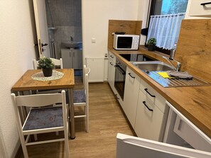 Fridge, microwave, oven, cookware/dishes/utensils - Wohnung 1 by Interhome (Ahrenshoop)