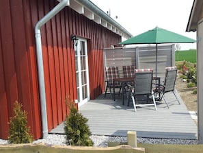 Outdoor dining - Gemütliches Schwedenhäuschen mit Terrasse by Interhome (Alt Jassewitz)