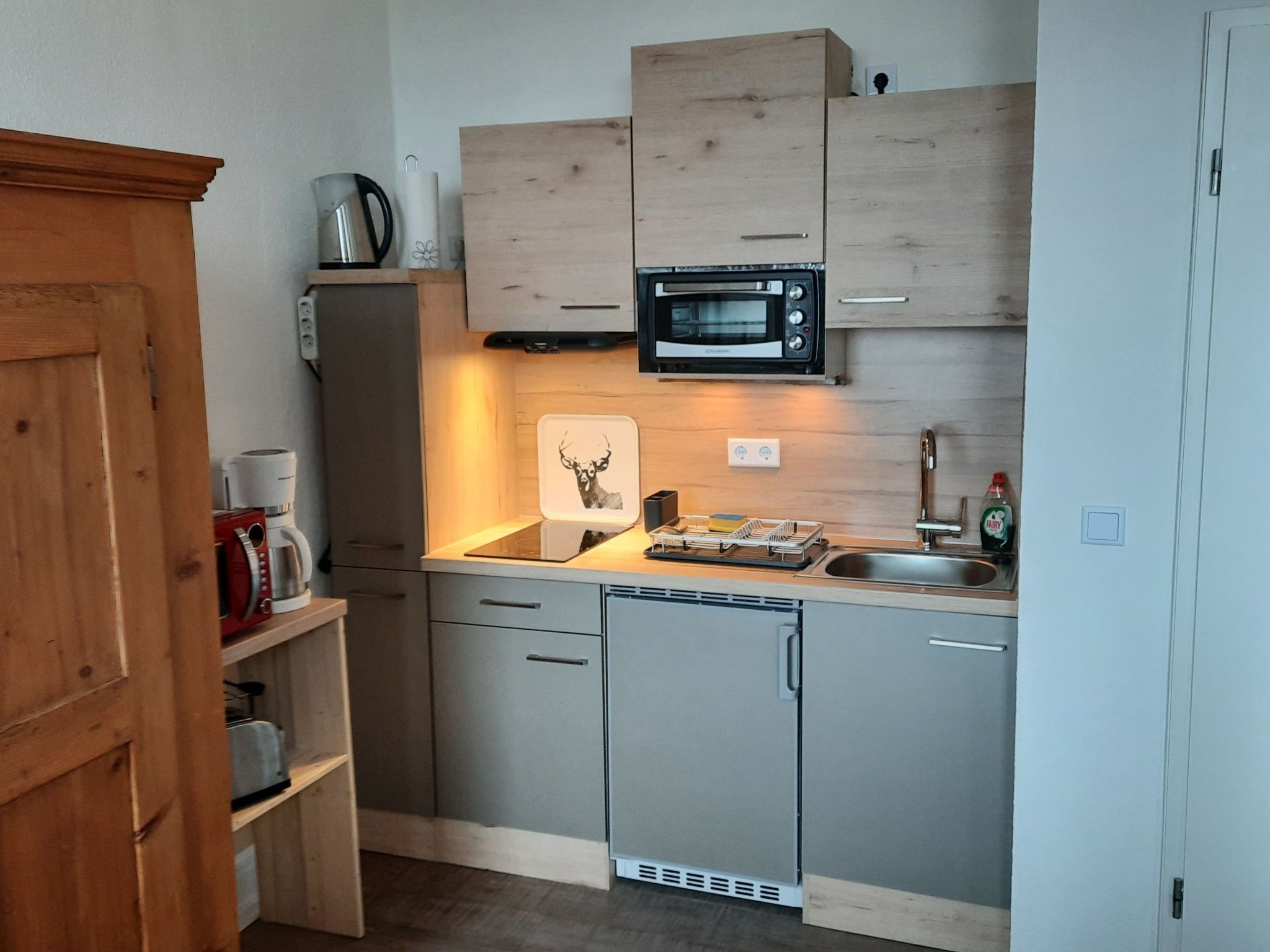 Fridge, microwave, cookware/dishes/utensils