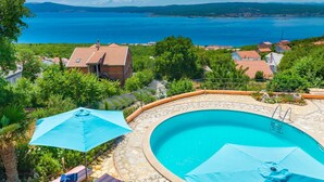 A pool with a clear view of the sea and surrounding houses. - Ferienvilla Ivanka in Crikvenica by Interhome (Crikvenica)