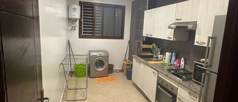 Fridge, oven, cookware/dishes/utensils