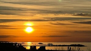 A sunset over a body of water with a bridge in the foreground. - Haus Nordstern by Interhome (Kalifornien)