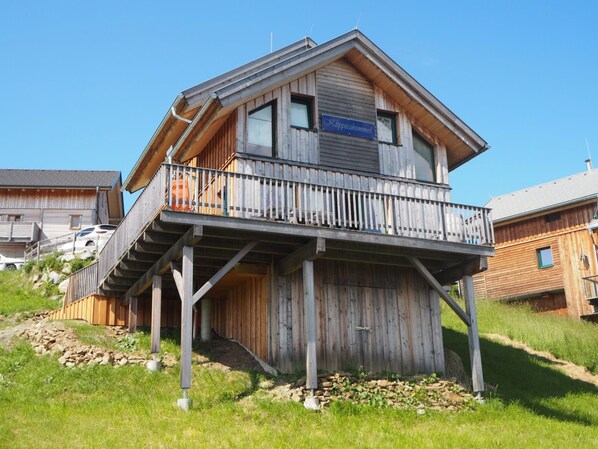 A wooden cabin with a balcony, a sign reading "Lippishimmel", and a car parked nearby. - Klippitzhimmel in Klippitztörl by Interhome (Bad St. Leonhard im Lavanttal)