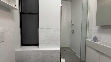 Shower, hair dryer, towels, soap