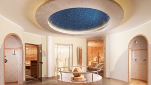 A spa area with a circular hot tub, wooden sauna, and a starry ceiling. - Wohnung Biohaus in Neukirchen am Großvenediger by Interhome (Neukirchen am Großvenediger)