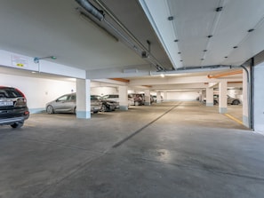 A multi-level parking garage with several cars parked. - Pegaz 17 an der Strandpromenade by Interhome (Swinoujscie)