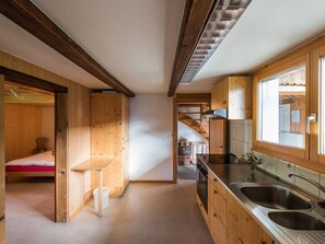 Fridge, oven, cookware/dishes/utensils