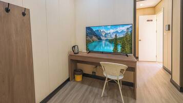 Chambre Double Confort | Coin séjour